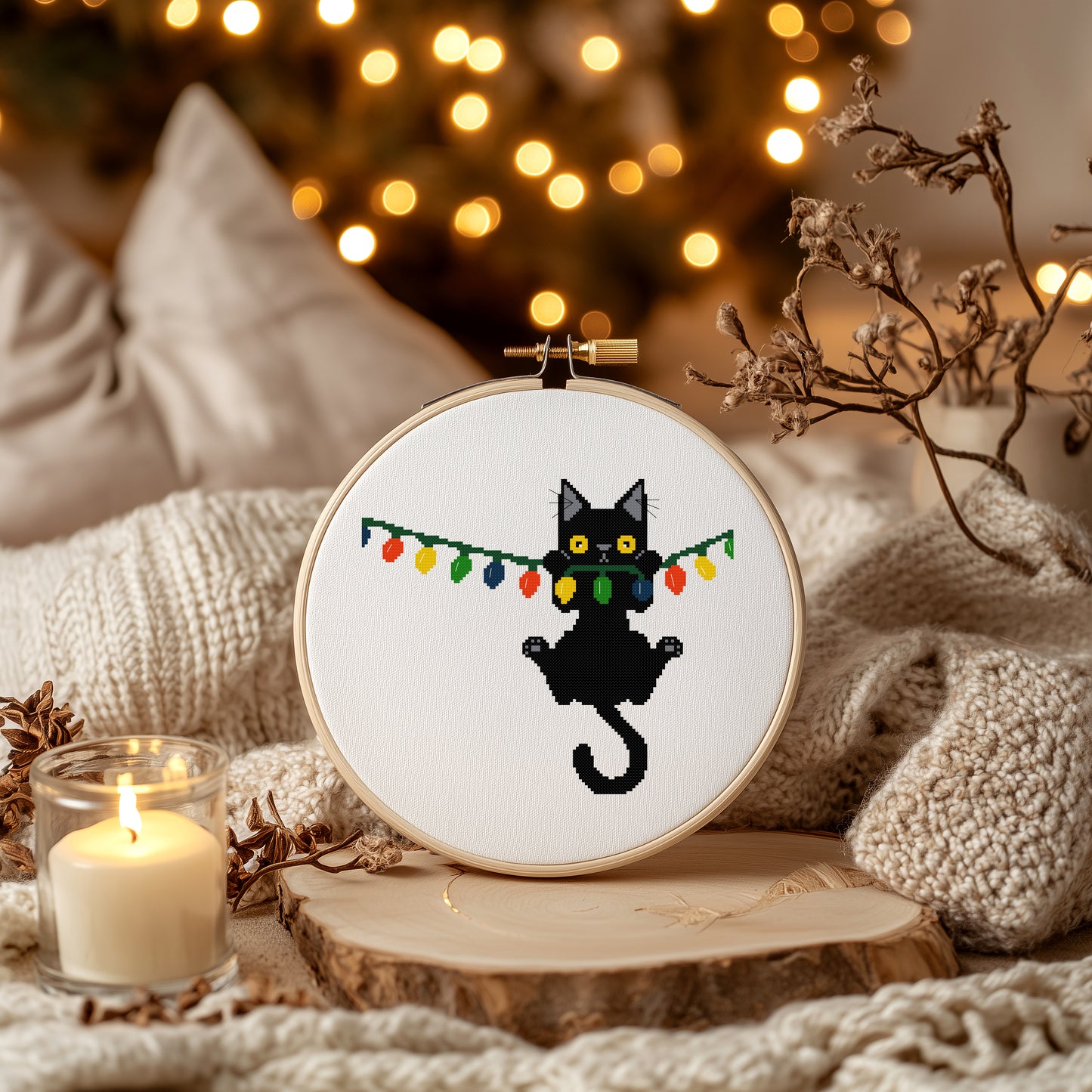 Christmas Black Cat Hanging from Lights Counted Cross Stitch Pattern